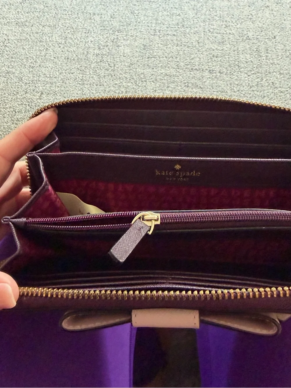 kate spade two-tone bow continental wallet in burgundy and blush